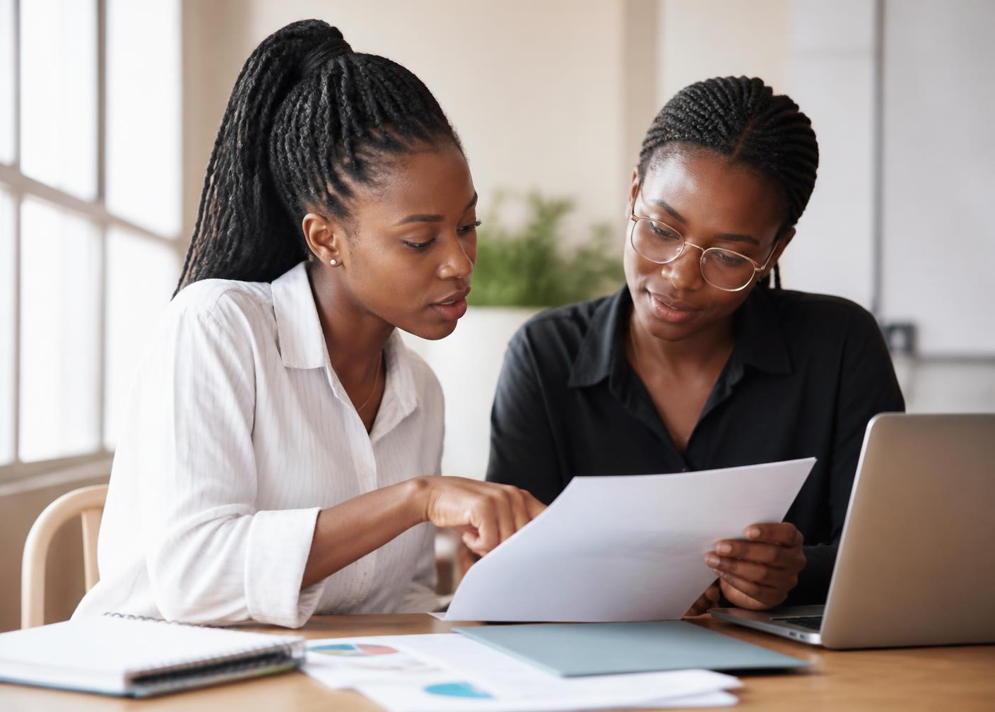AYCADO Career Hub adviser guiding a young African graduate through career and job search preparation